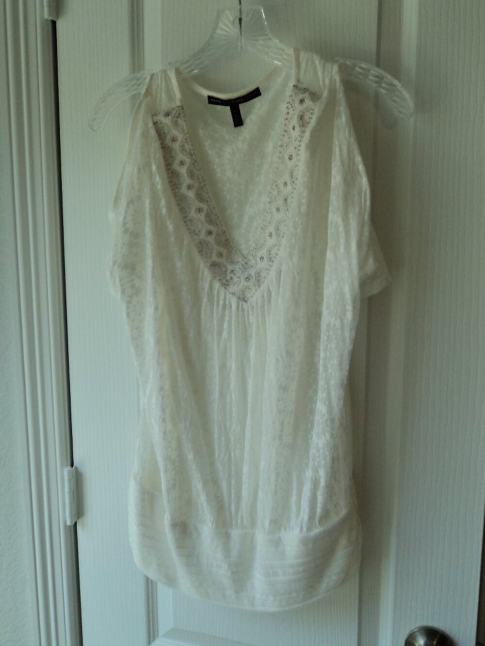 Women's Sleeveless White Top W/Silver Lapel Trim